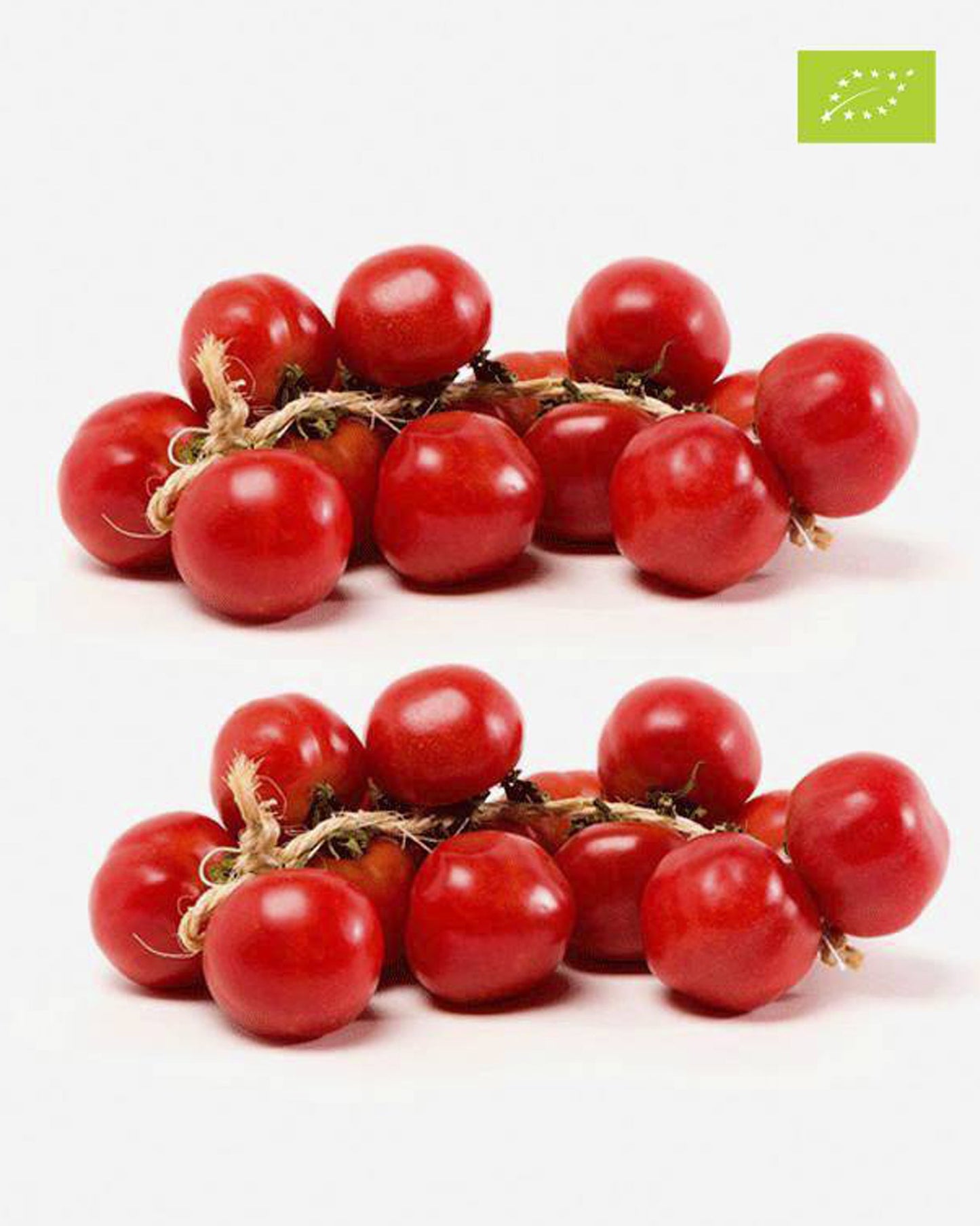 Dos ristras de tomate de penjar