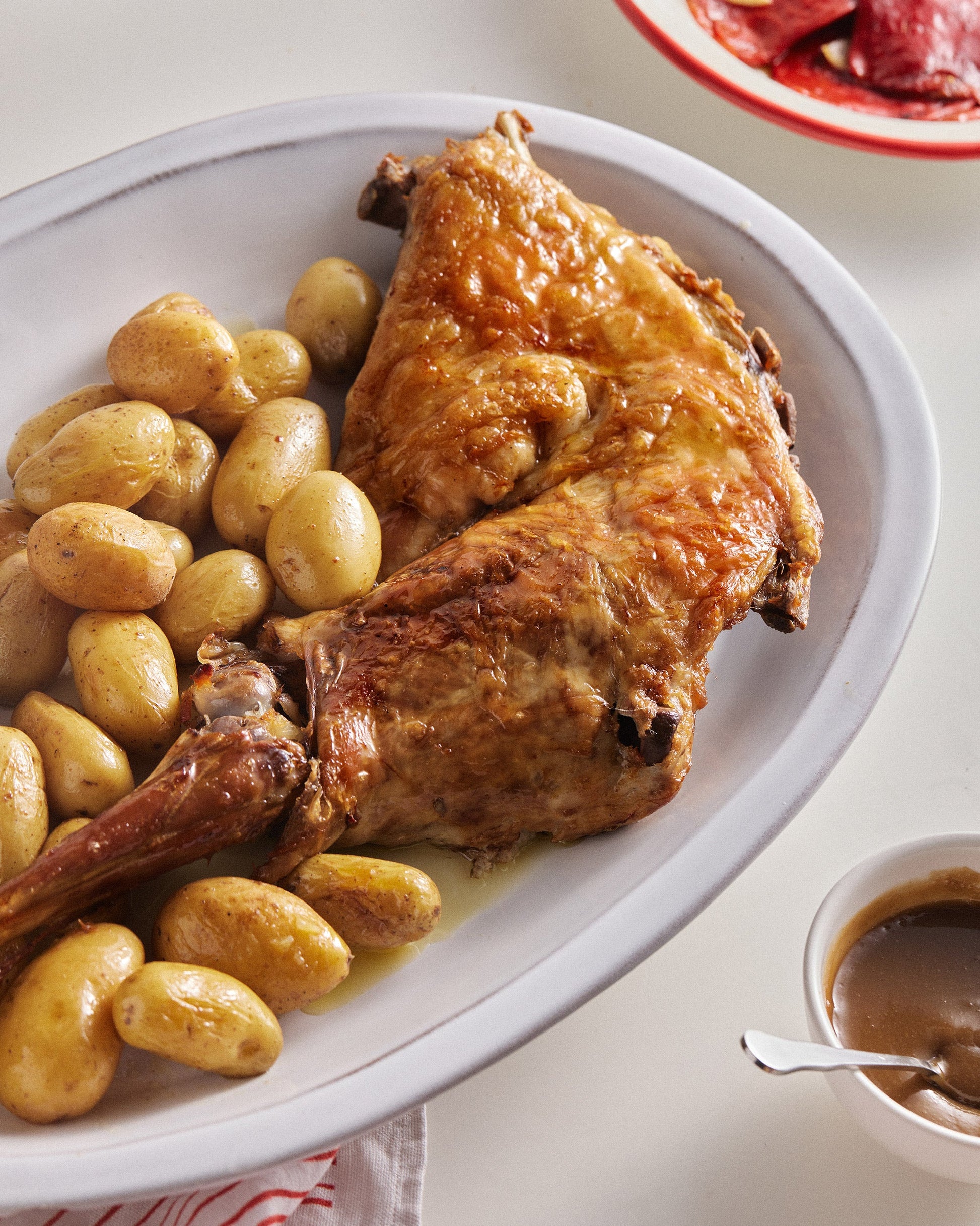 cuarto de cordero lechal asado