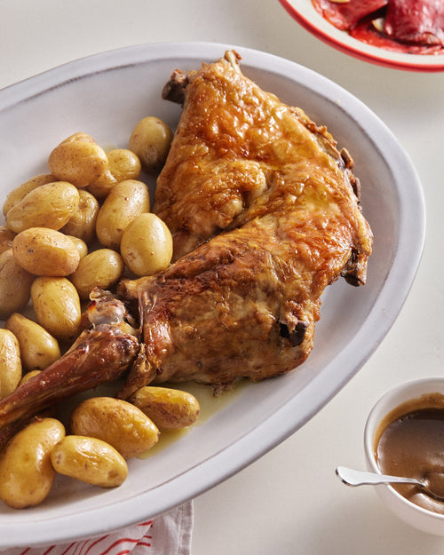 cuarto de cordero lechal asado