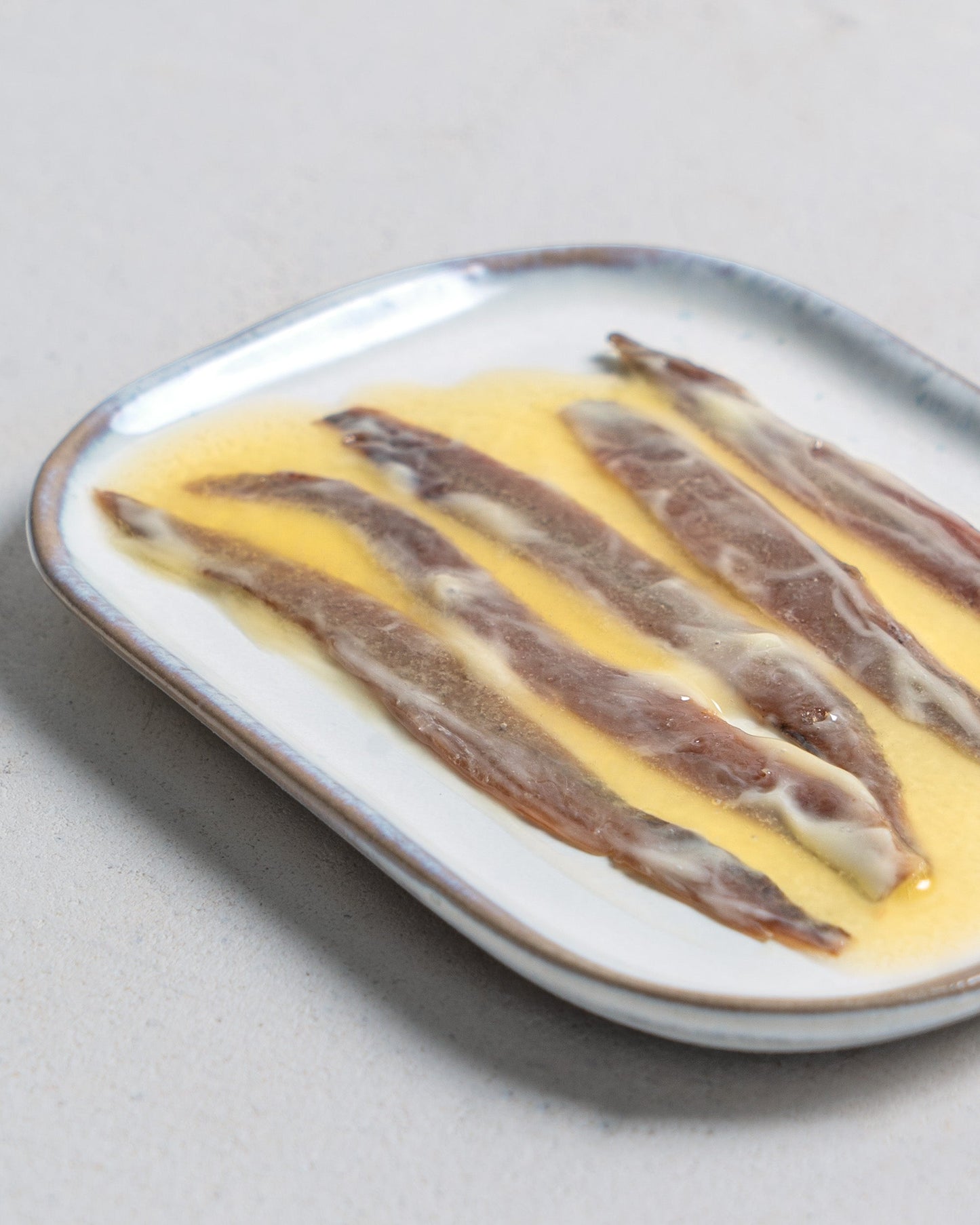 Anchoas en mantequilla ahumada